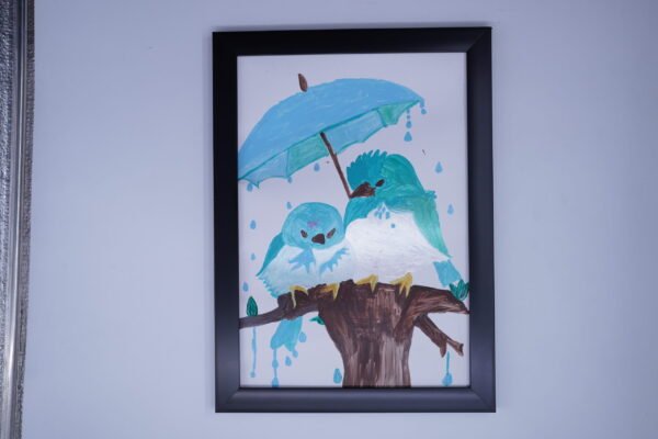 Hand painted artwork under an umbrella Hand Painting of Duo Bird Couple